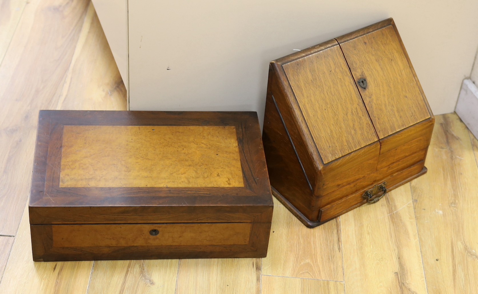 A Victorian birds eye maple and rosewood writing slope, 44.5 cms wide x 14 cms high.